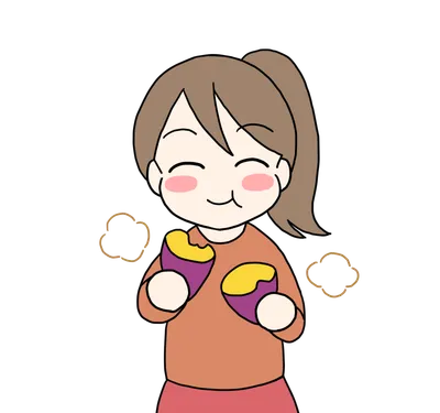 焼き芋を持つ笑顔の女の子