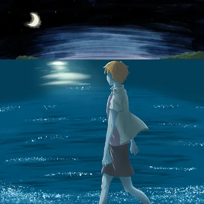 夜の海辺を歩く人