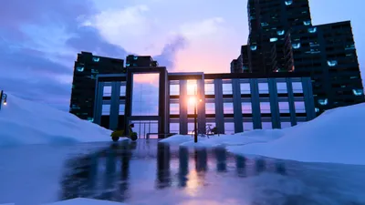 雪の都市の夕焼け